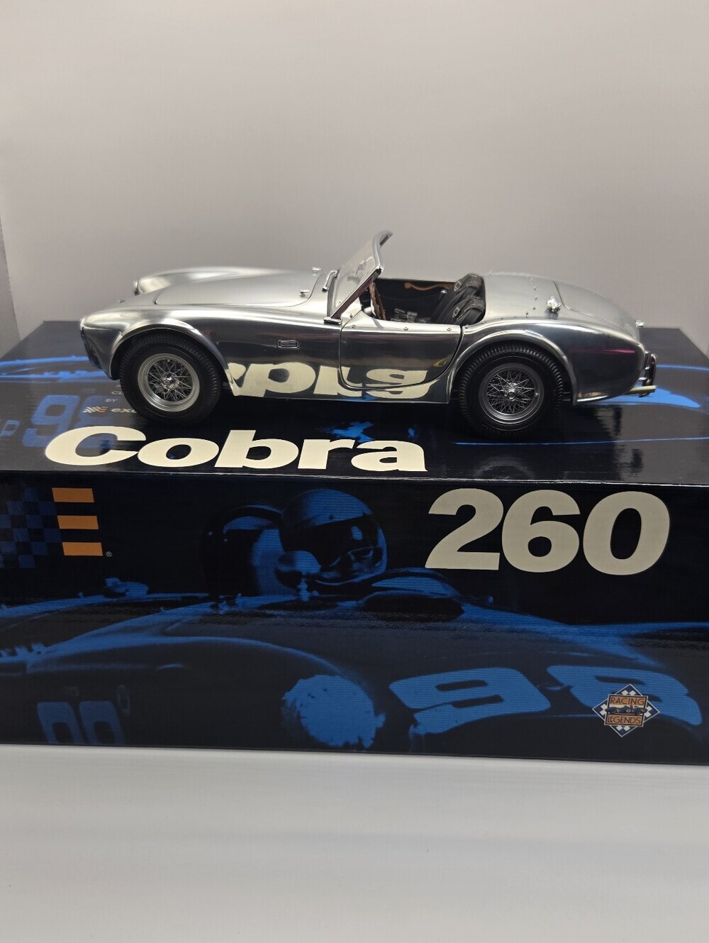 Exoto Racing Legends 1:18 Scale 1962 Shelby AC Cobra 260 diecast model featuring
